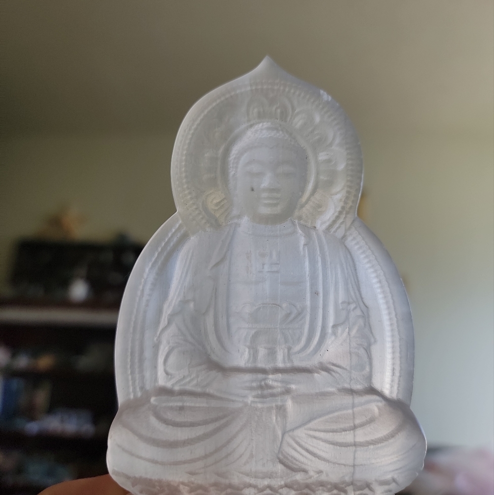 Selenite buddha carving